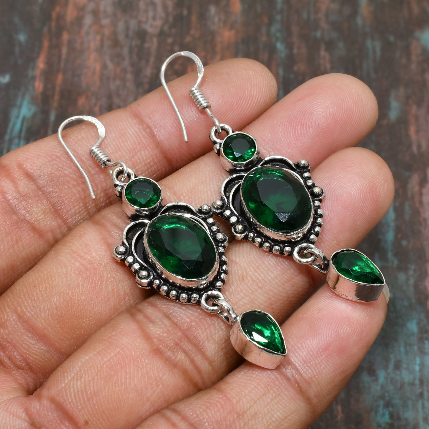 Isolde’s Embrace – Emerald Silver Earrings