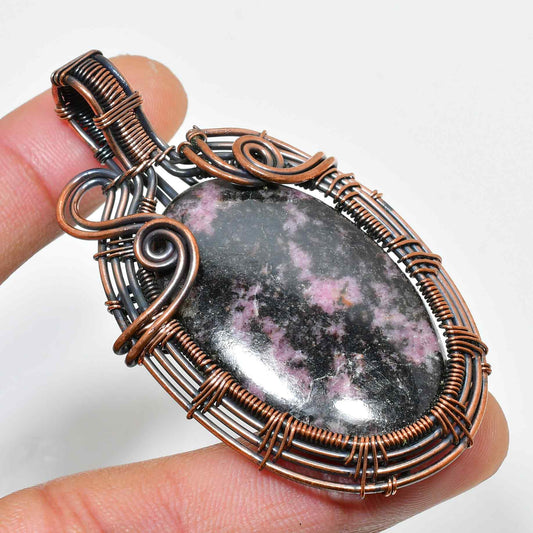 Amara’s Embrace – Rhodonite Copper Pendant