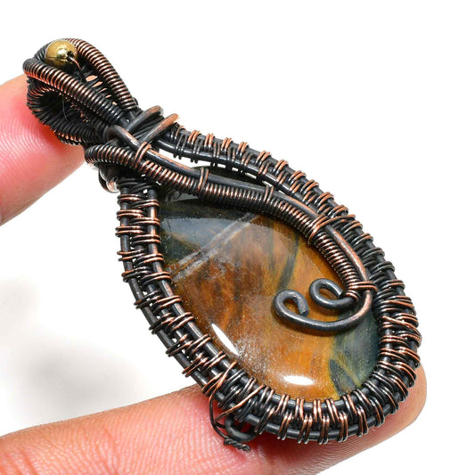 Stellar Guardian – Tiger’s Eye Copper Pendant