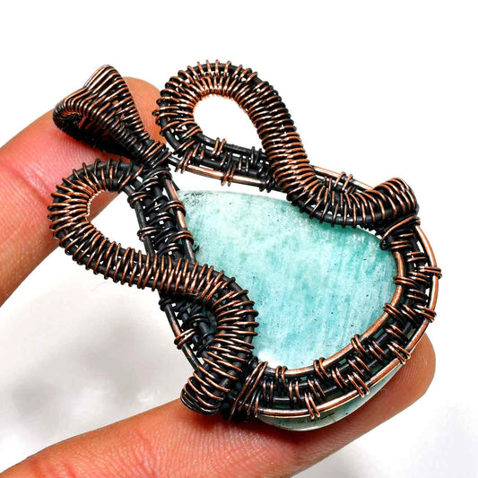 Ocean’s Embrace – Aquamarine Copper Pendant