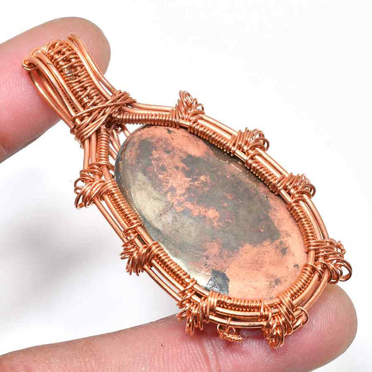 Ember’s Embrace – Copper Stone Wire-Wrapped Pendant