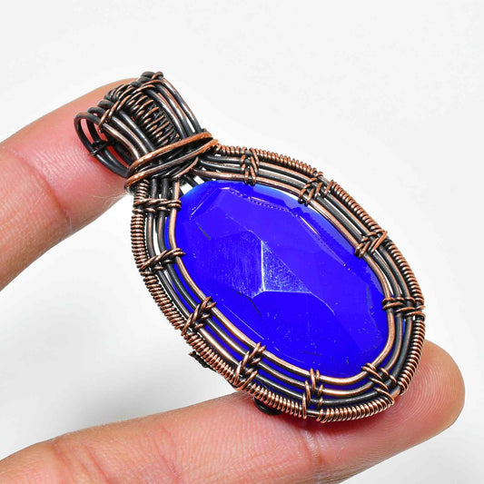 Azure Embrace – Handwrapped Sapphire & Copper Pendant