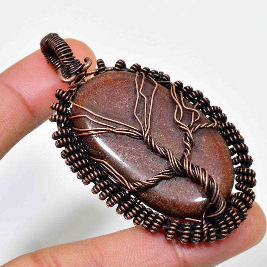 Earth’s Embrace – Copper-Wrapped Earthstone Pendant