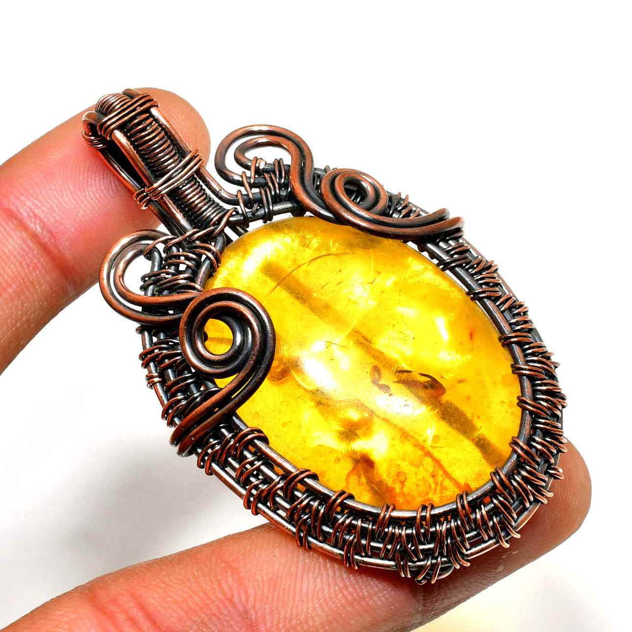 Ember’s Embrace – Amber Copper Pendant