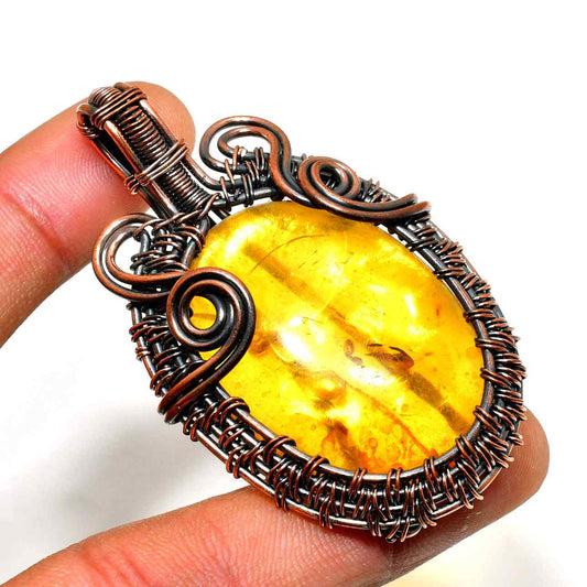 Ember’s Embrace – Amber Copper Pendant
