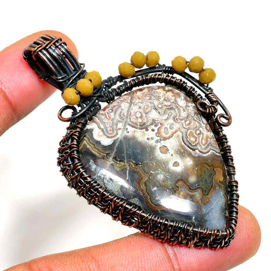 Gaia’s Balance – Oxidized Copper Agate Pendant