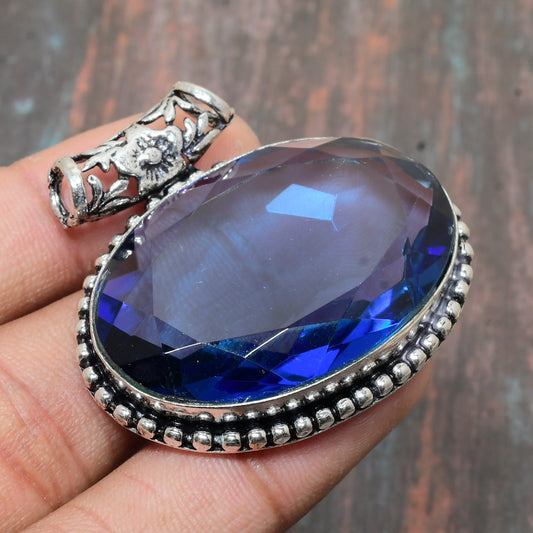Majestic Sapphire Embrace – Sterling Silver Filigree Pendant
