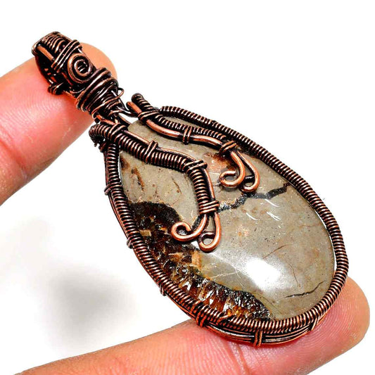 Gaia’s Embrace – Copper-Wrapped Stone Pendant
