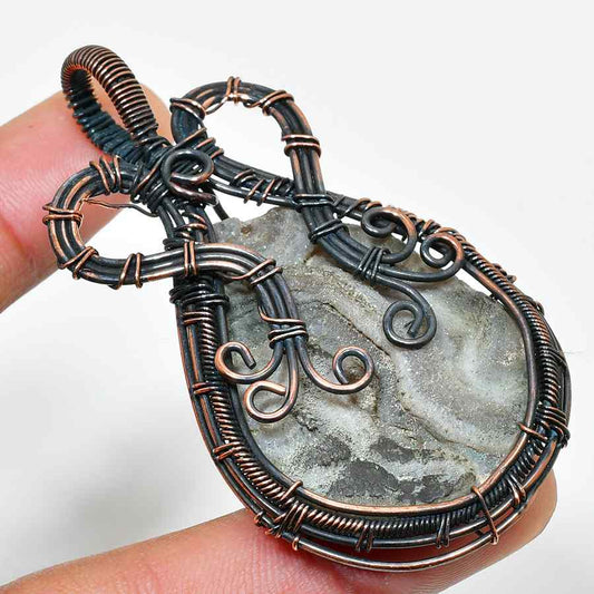 Terra’s Embrace – Oxidized Copper & Earth Stone Pendant