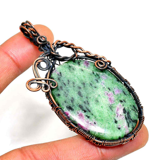 Heart’s Embrace – Rhodonite Copper Pendant