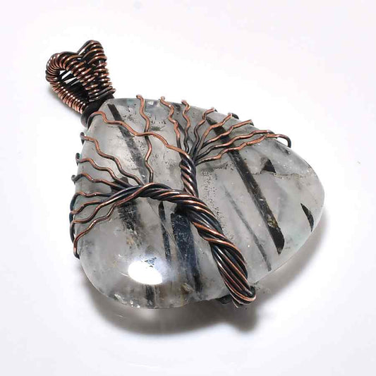 Gaia’s Embrace – Oxidized Copper Quartz Pendant