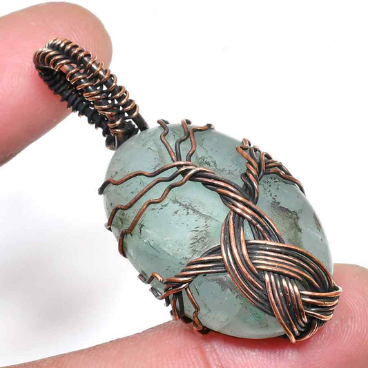 Clarity’s Embrace – Fluorite & Copper Pendant