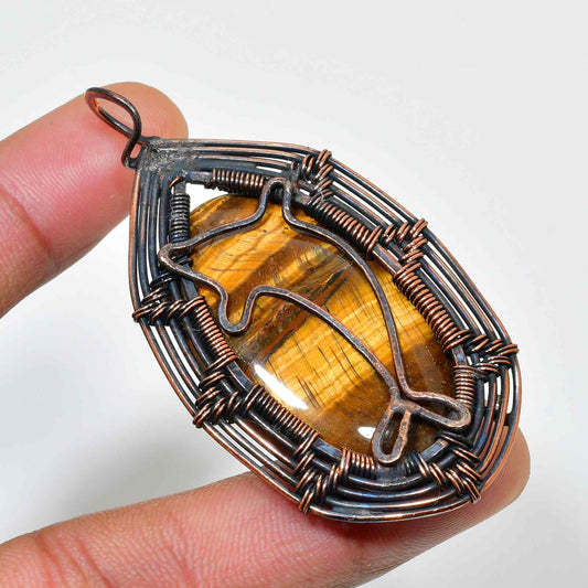 Gilded Guardian – Tiger’s Eye Copper Pendant