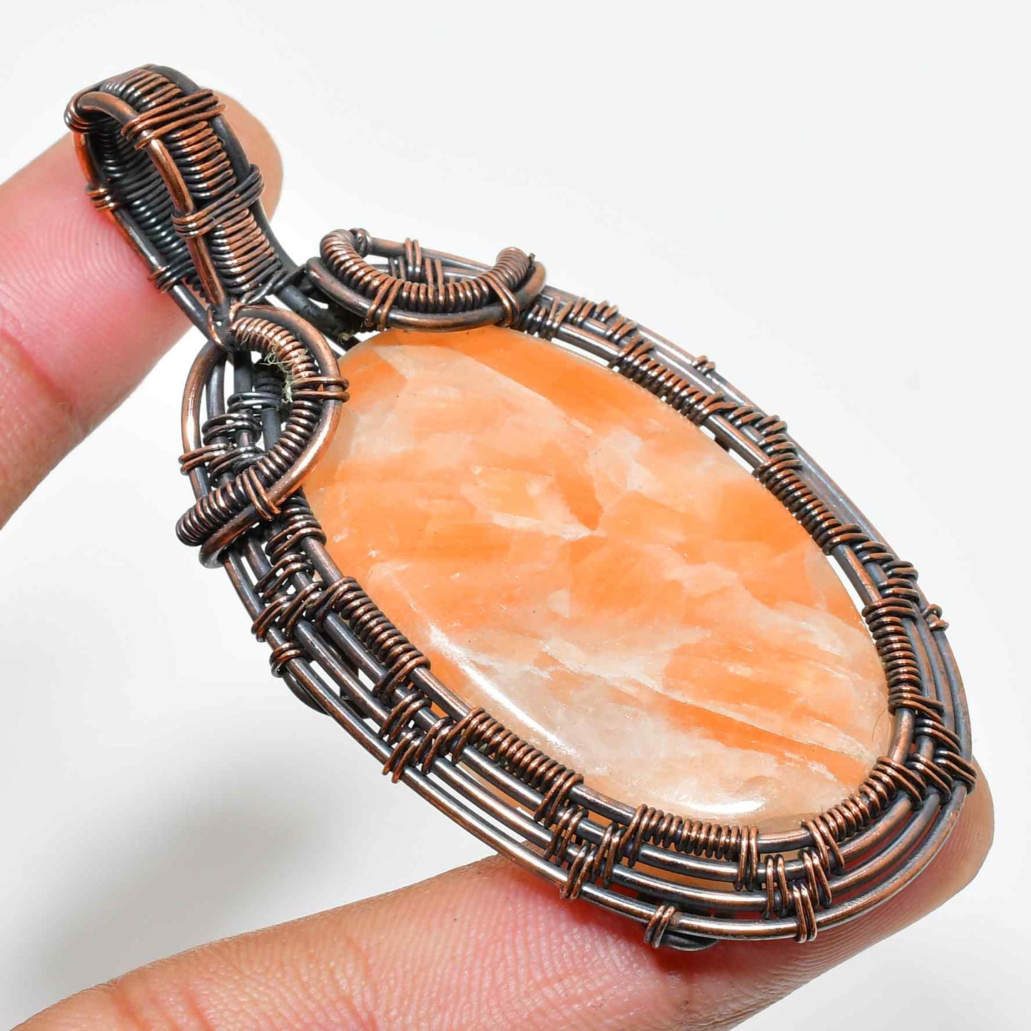 Ember’s Heart – Copper-Wrapped Sunstone Pendant