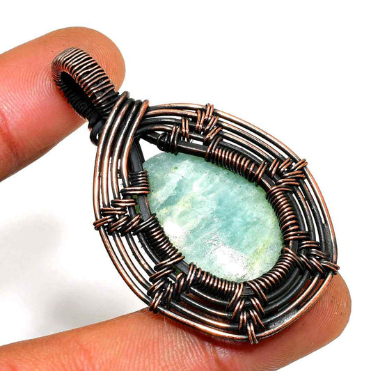 Serenity’s Embrace – Aquamarine Copper Pendant