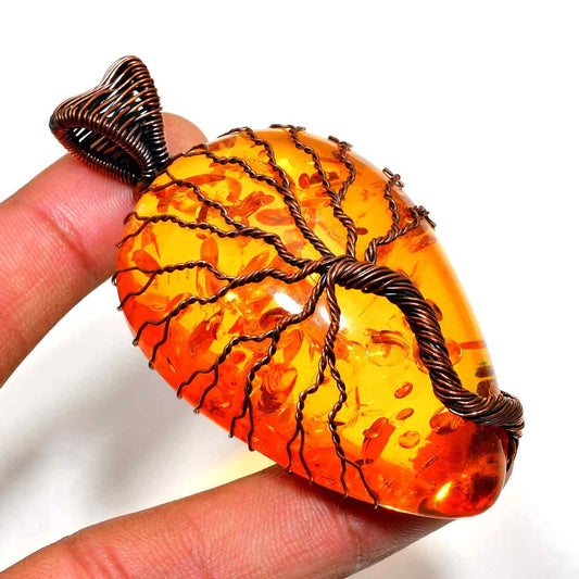 Solara’s Glow – Handwrapped Amber & Copper Pendant