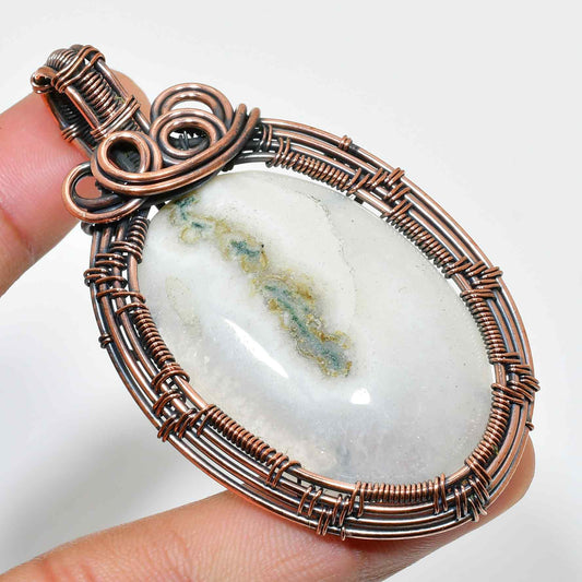 Ember’s Embrace – Copper-Wrapped Stone Pendant