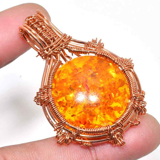 Ember’s Embrace – Copper-Wrapped Amber Pendant