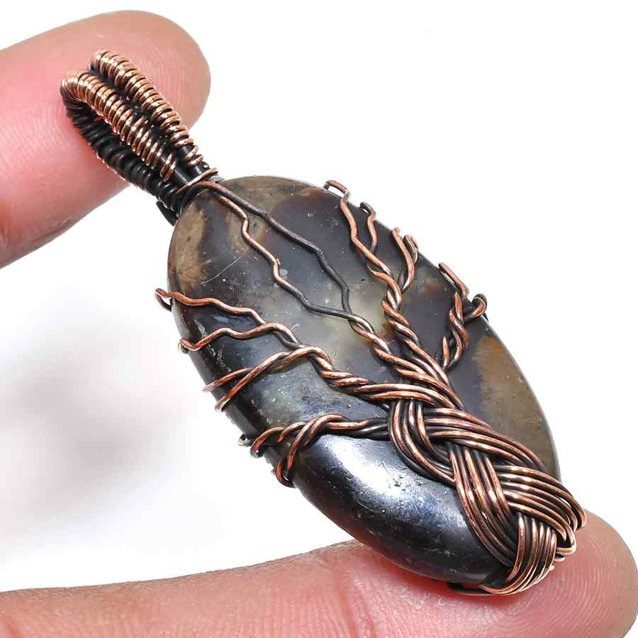 Gaia’s Embrace – Copper-Wrapped Natural Stone Pendant