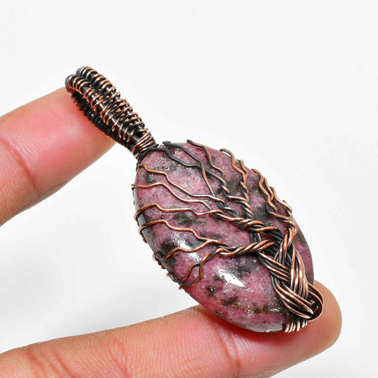Ember’s Essence – Rhodonite Copper Pendant