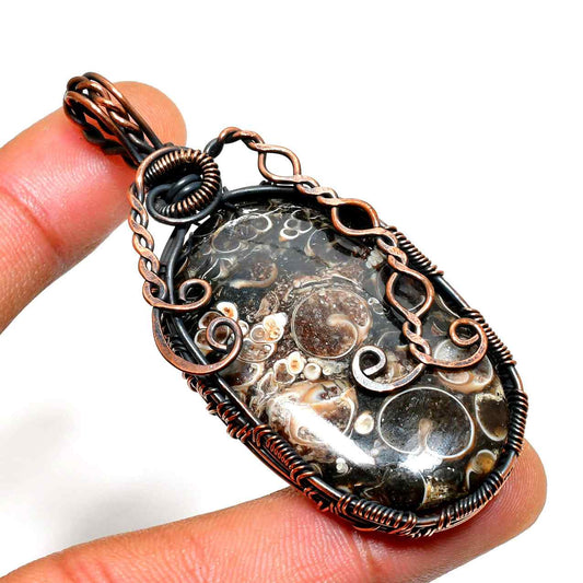 Gaia’s Embrace – Fossil Copper Wire Pendant