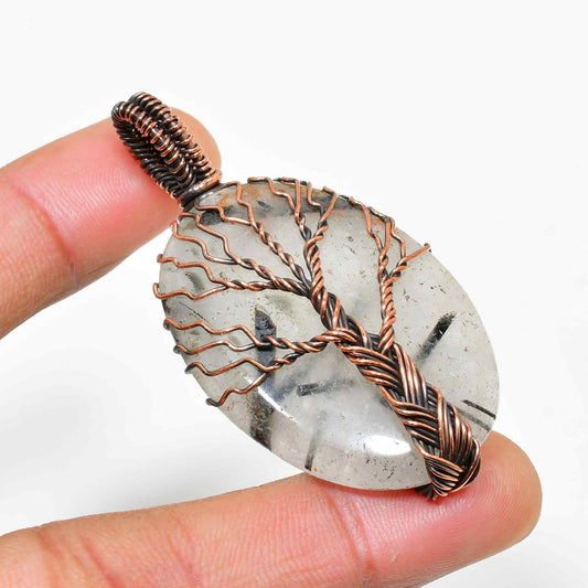 Gaia’s Embrace – Clear Quartz Tree of Life Pendant