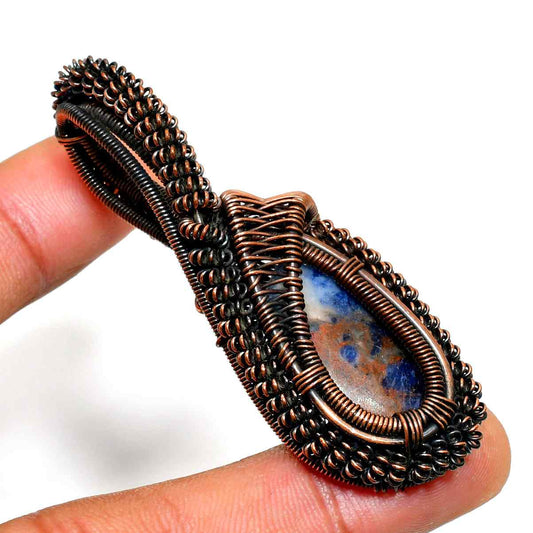 Raven’s Embrace – Copper-Wrapped Mystic Stone Pendant