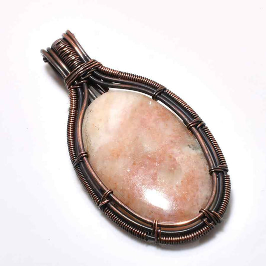Elysia’s Embrace – Rose Quartz Copper Pendant