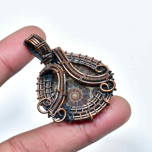 Earthbound Spiral – Copper-Wrapped Ammonite Pendant