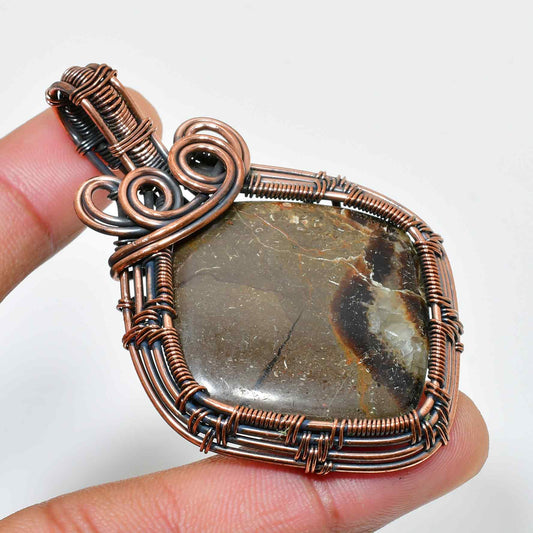 Gaia’s Harmony – Oxidized Copper Agate Pendant