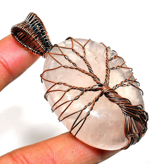 Serenity’s Blossom – Rose Quartz Tree of Life Pendant