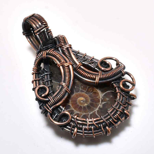 Amara’s Essence – Oxidized Copper Fossil Pendant