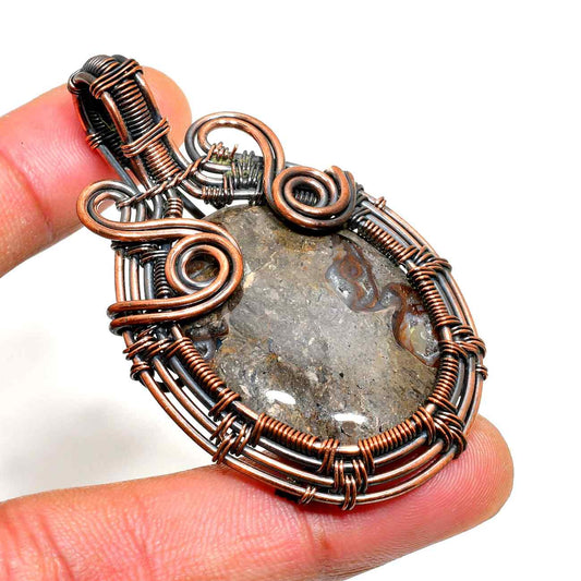 Gaia’s Balance – Oxidized Copper Agate Pendant