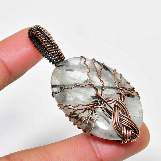 Nature’s Embrace – Copper-Wrapped Quartz Pendant