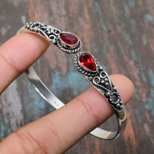 Scarlet Serenade – Ruby Teardrop Silver Bracelet
