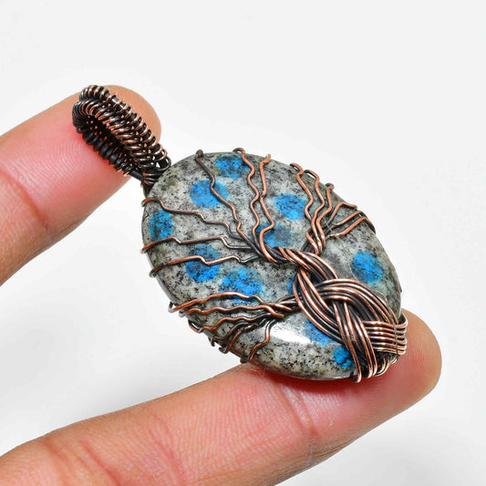 Earthbound Enchantment – Copper-Wrapped Stone Pendant