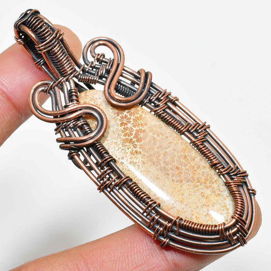Terra’s Bloom – Copper-Wrapped Fossilized Stone Pendant