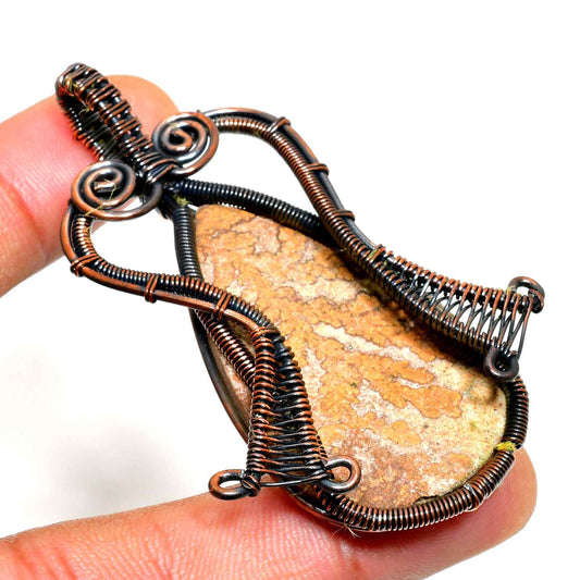 Earthbound Embrace – Polished Stone & Oxidized Wire Pendant
