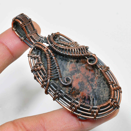 Gaia’s Embrace – Copper & Silver Wire-Wrapped Gemstone Pendant
