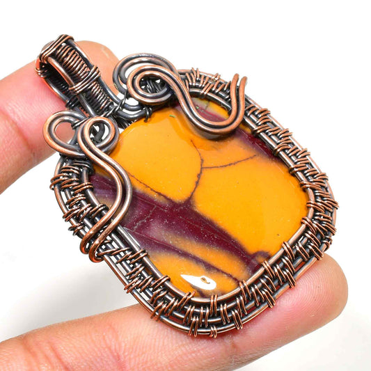 Seraphine’s Grace – Artisan Copper-Wrapped Stone Pendant