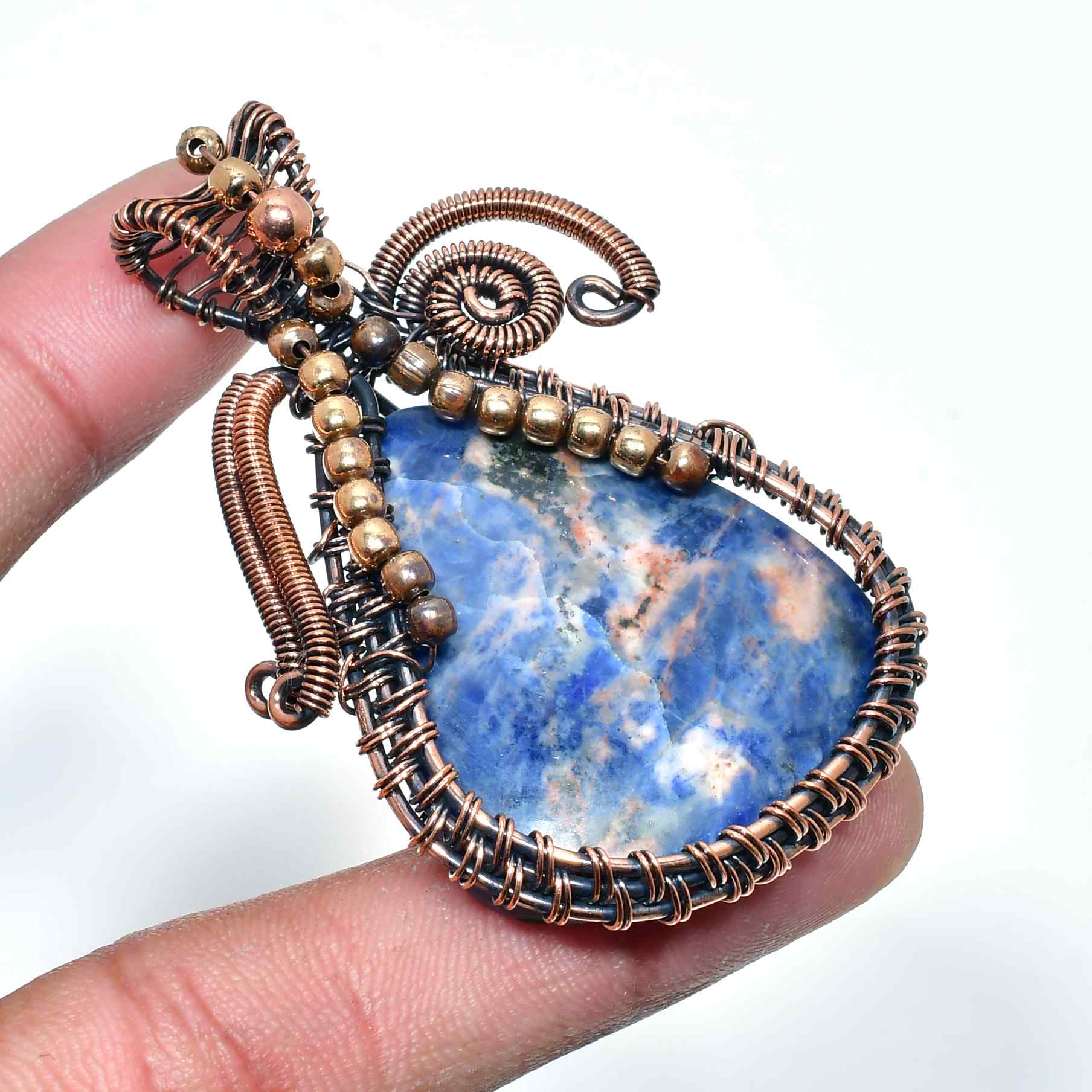 Harmony’s Embrace – Sodalite Copper Pendant