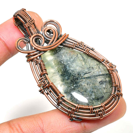 Ember’s Guardian – Oxidized Copper Crystal Pendant