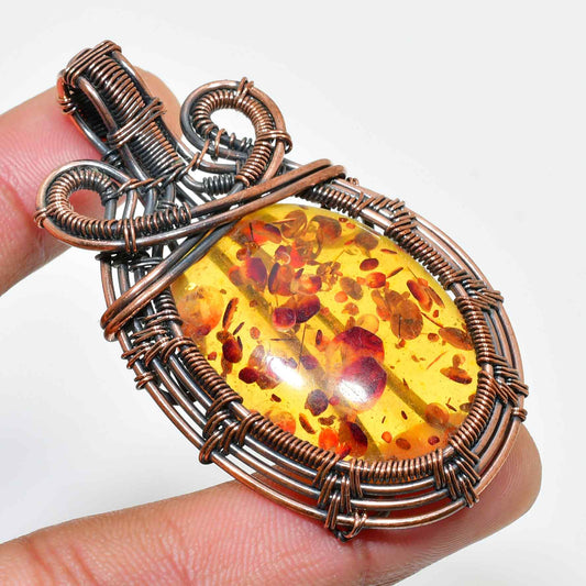 Ember Dawn – Copper-Wrapped Amber Pendant