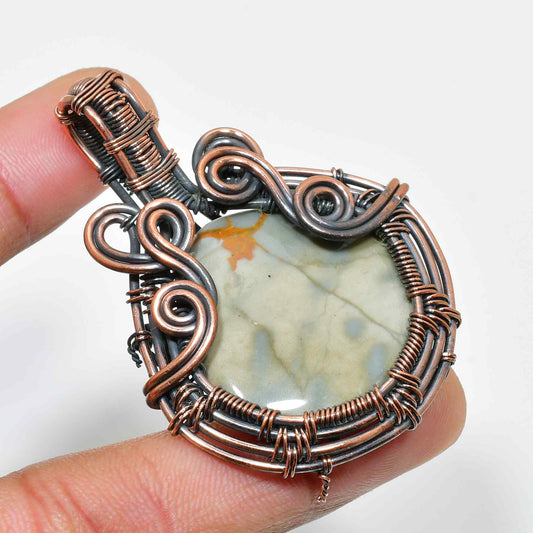 Harmony’s Embrace – Copper-Wrapped Calming Stone Pendant