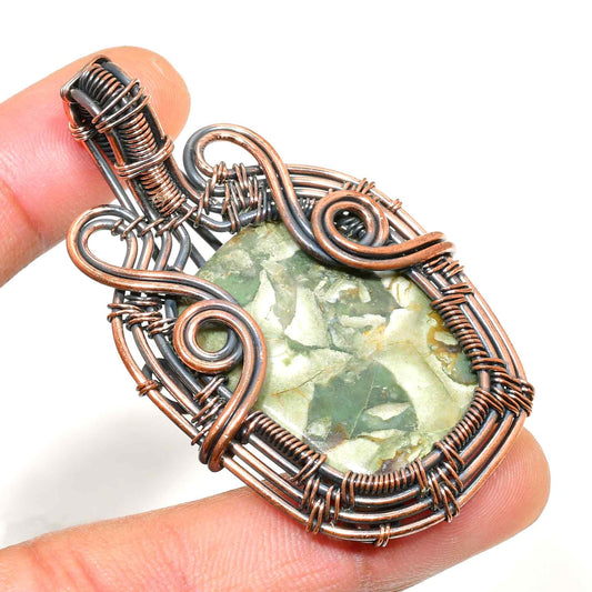 Gaia’s Embrace – Copper-Wrapped Natural Stone Pendant