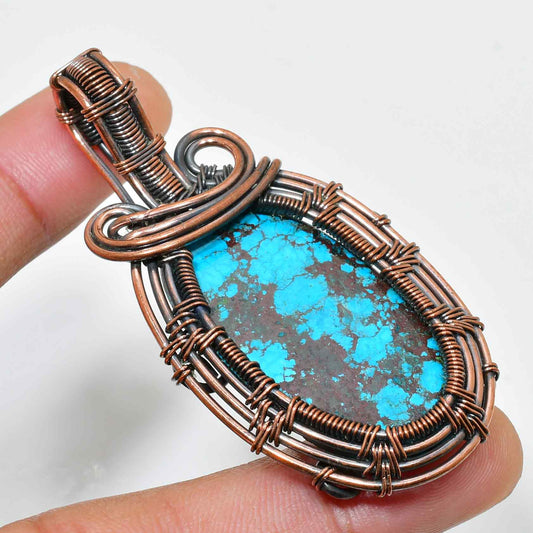 Azure’s Embrace – Turquoise Copper Pendant