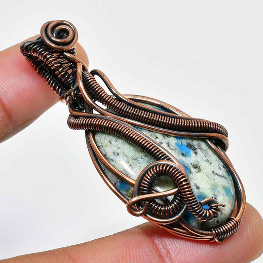 Ember’s Whisper – Copper-Wrapped Grounding Stone Pendant