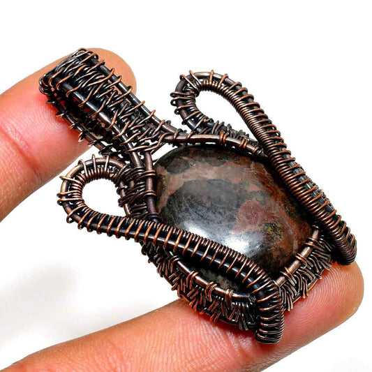 Terra’s Embrace – Earthstone Copper Pendant