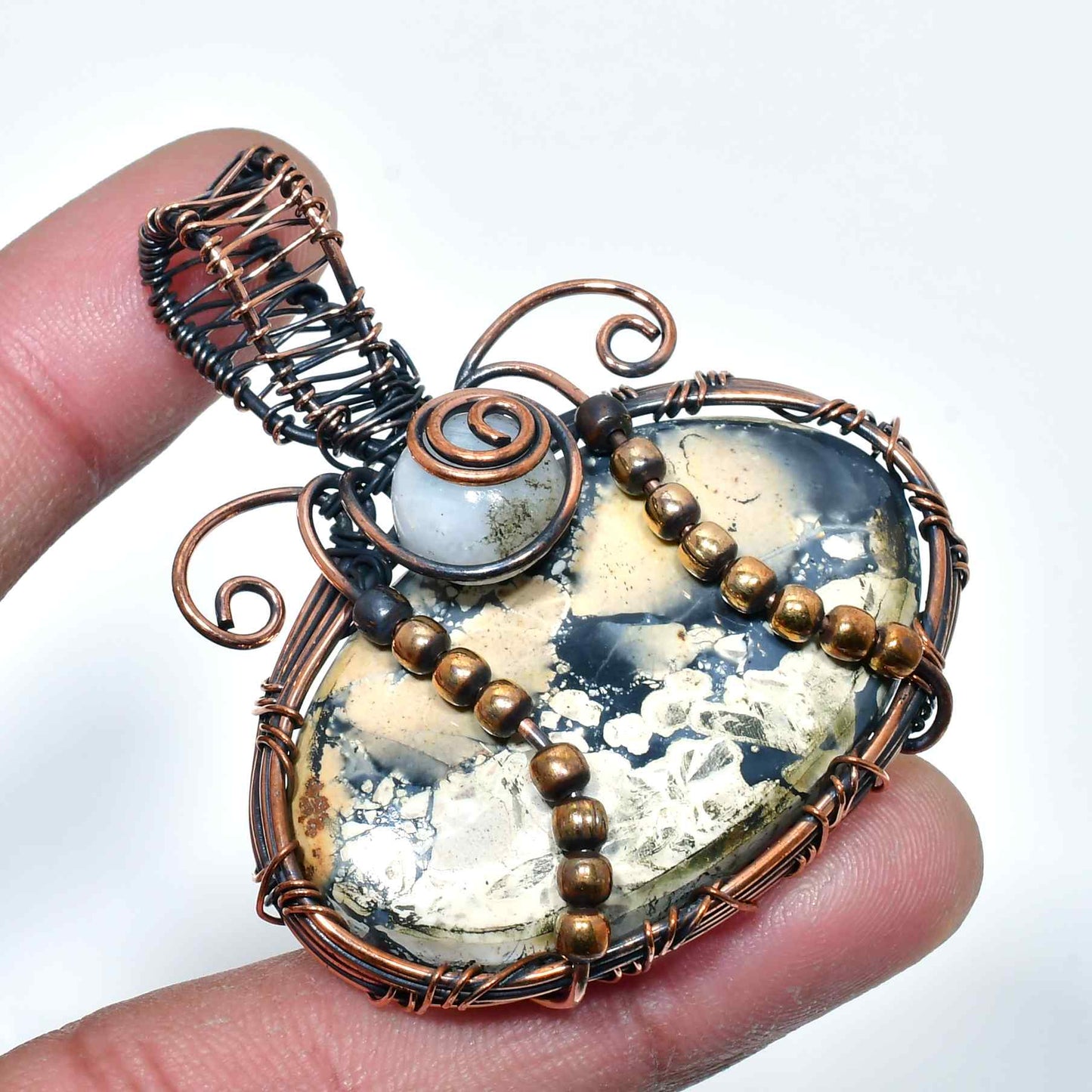 Harmony’s Embrace – Natural Stone Copper Pendant