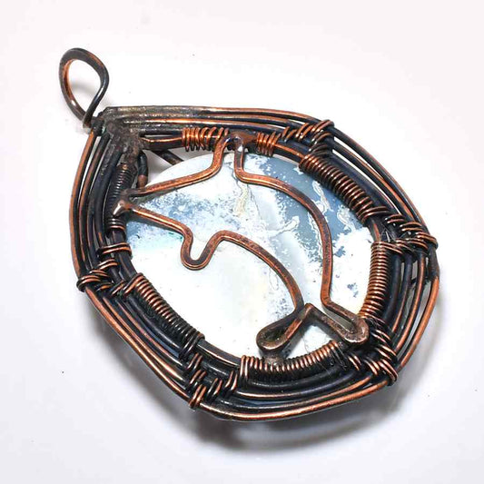 Dolphin’s Embrace – Marbled Stone & Oxidized Copper Pendant